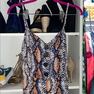 snake skin jumpsuit cut out back